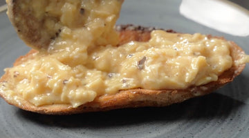 Scrambled Eggs with White Truffle Butter on Sourdough Bread
